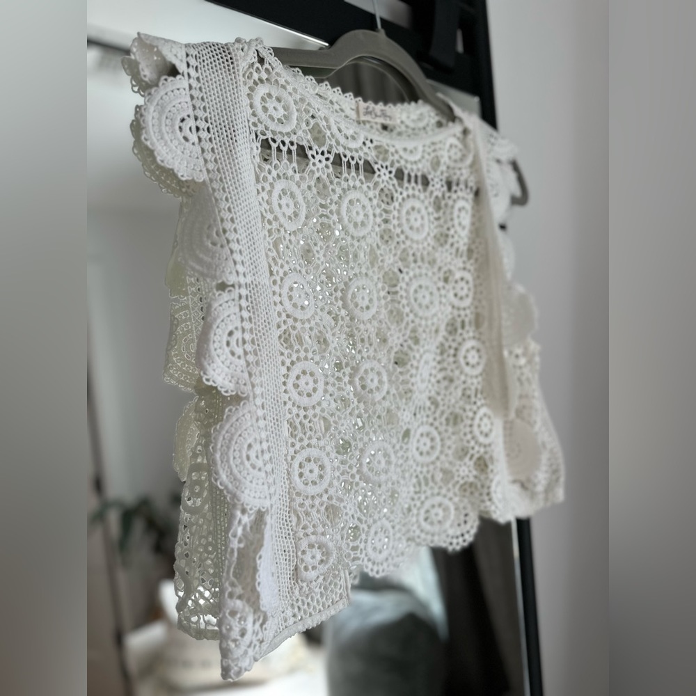 White lace top from LoveShackFancy.